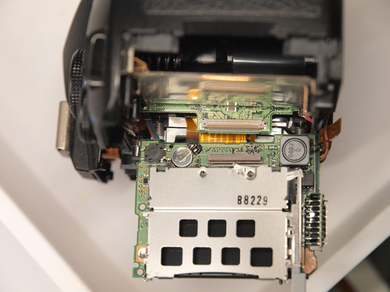 Olympus E-410 電源スイッチの接触不良を修理する: くぼたかずみ